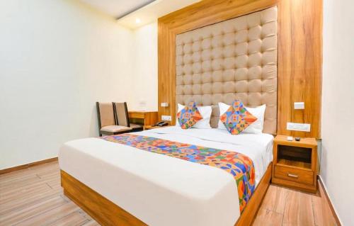 En eller flere senge i et værelse på Cozy Inn T2 Mumbai Airport