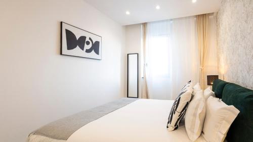 Katil atau katil-katil dalam bilik di Skyline Lofts by LovelyStay