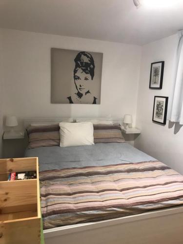 Säng eller sängar i ett rum på Apple House
