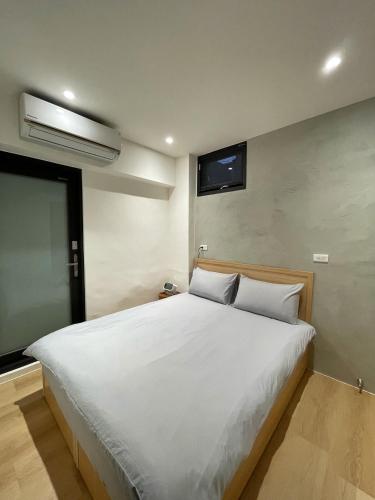 Postel nebo postele na pokoji v ubytování 無生居 Wu Sheng Stay