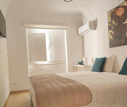 Katil atau katil-katil dalam bilik di Luxury Palm Suites