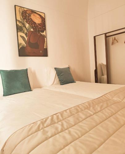 Katil atau katil-katil dalam bilik di Luxury Palm Suites