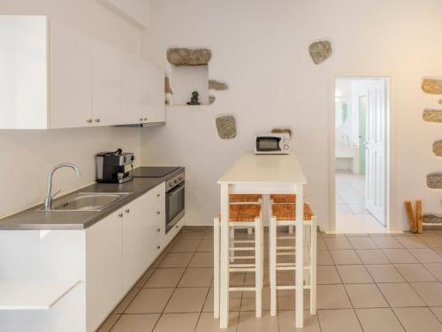 Kuchyň nebo kuchyňský kout v ubytování BayBees Sea View Residence
