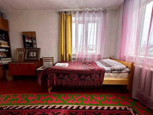 Una cama o camas en una habitación de Kayyr Guest House