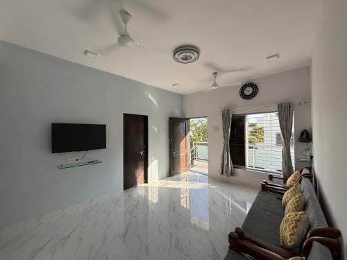 TV a/nebo společenská místnost v ubytování White Haven Homestay