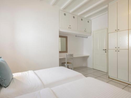 Postel nebo postele na pokoji v ubytování BayBees Sea View Residence