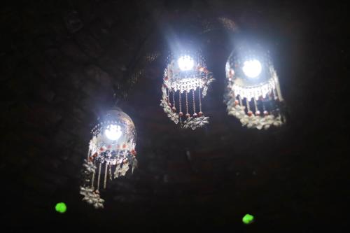an image of an american flag light at night at Old Nubian guest house in Aswan