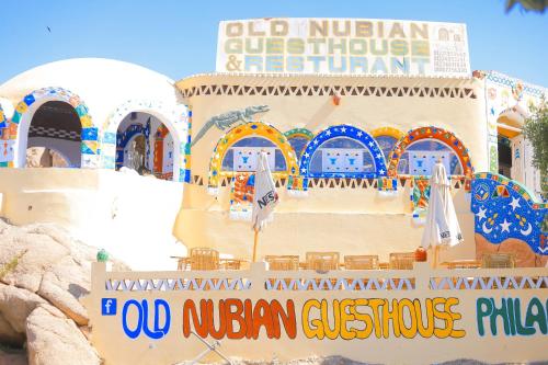 a building with a sign that reads old nubian architecture restaurant at Old Nubian guest house in Aswan