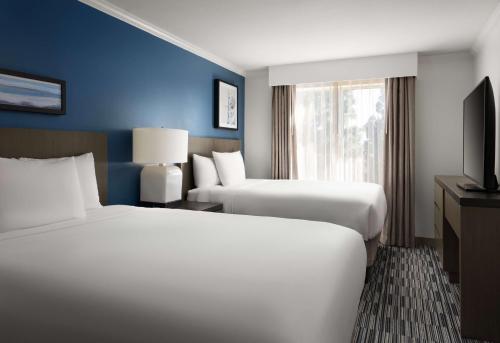 Un ou plusieurs lits dans un hébergement de l'établissement Hyatt House San Diego Sorrento Mesa