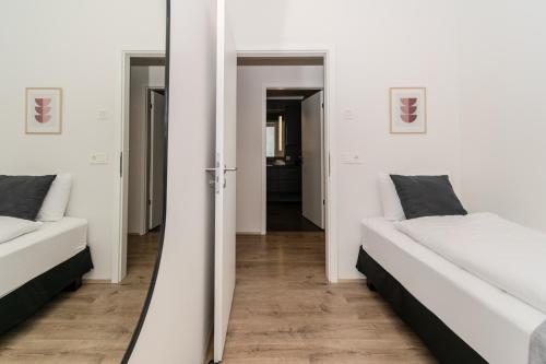 Una cama o camas en una habitación de Sif Apartments by Heimaleiga