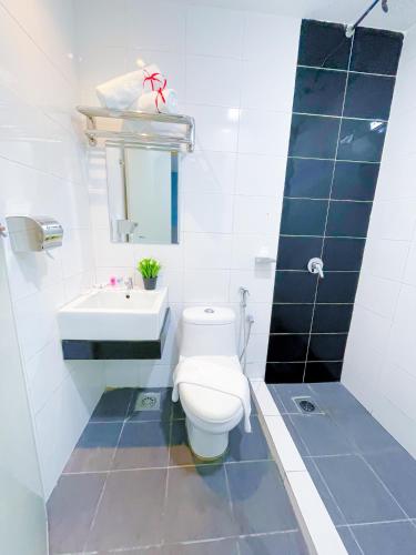 Ванная комната в StarQ Hotel Kuala Lumpur