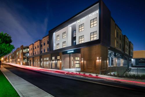 a building on the side of a street at night at Hyatt Place Nashville/Green Hills in Nashville