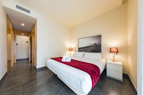 A bed or beds in a room at Cituspace Sandoval