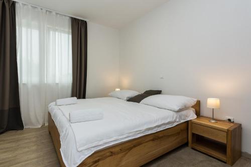 Posteľ alebo postele v izbe v ubytovaní VILLA PETAR'S DREAM 3