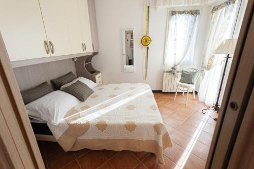 Un pat sau paturi într-o cameră la 24 Ore al Sole by Wonderful Italy