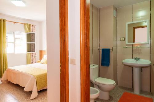 Ванна кімната в Apartamentos Kasa