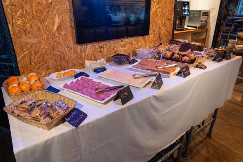 a white table with food on top of it at Urban Nomad - Camden Town in London