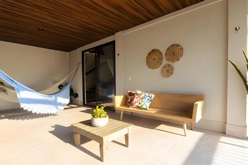 Ruang duduk di Casa confortável com vista mar e piscina