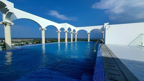 a swimming pool on the roof of a building at Nhung's House in Thôn Dương Phẩm