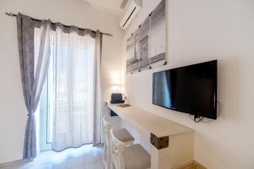 TV a/nebo společenská místnost v ubytování B&B Camera a Sud Mare'