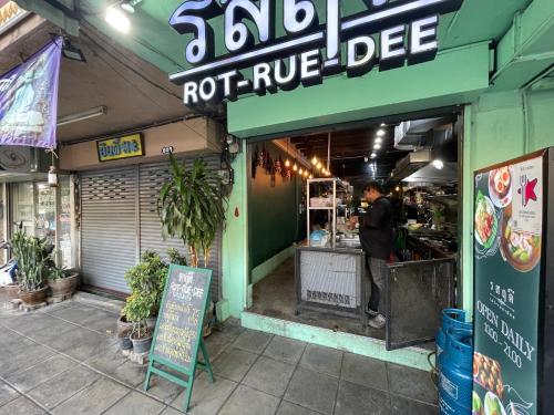 a man standing in front of a notre dameccess at 168 House 4A4B 350m BTS Krungton Buri near Icon Siam in Godown