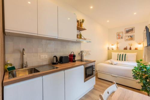 Køkken eller tekøkken på Studio fonctionnel, équipé avec jardin proche gare