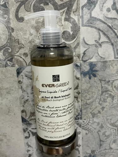 a bottle of oxygen liquid sitting on a counter at Il Bosco Incantato in Borgo San Dalmazzo
