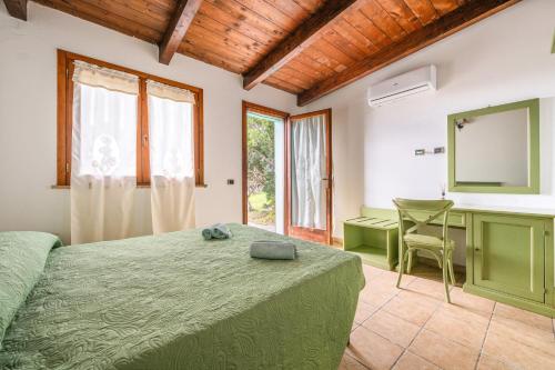 Ένα ή περισσότερα κρεβάτια σε δωμάτιο στο Villa Olga
