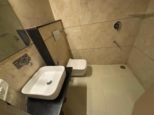 Salle de bains dans l'établissement Hotel Maya international