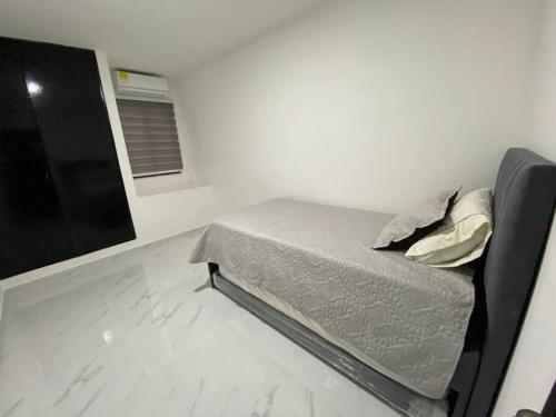 Cama ou camas em um quarto em Apartamento excelente ubicación