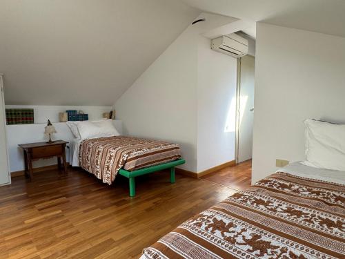 Ένα ή περισσότερα κρεβάτια σε δωμάτιο στο Agriturismo Virano19