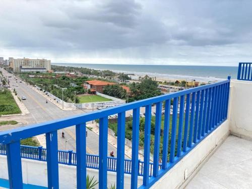 a balcony with a view of the beach at Villa Del Sol Hotel Fortaleza in Fortaleza