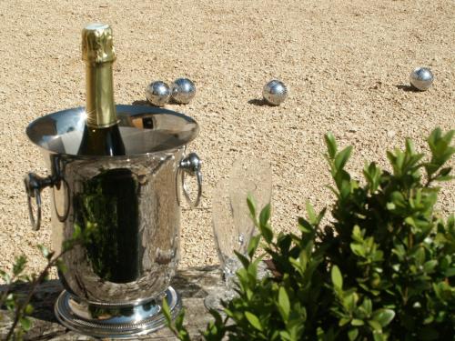 a bottle of champagne in a ice bucket at La Closerie des Sacres in Lavannes