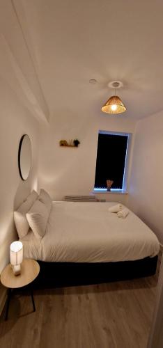 A bed or beds in a room at ApartHotel Flat 9 - 10 min to centre by Property Promise