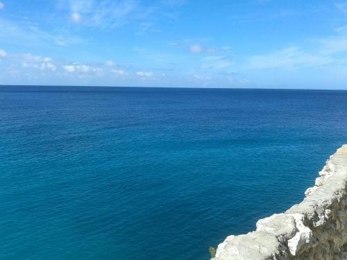a view of the ocean from a cliff at Bon Bini Lagun Curacao in Lagun