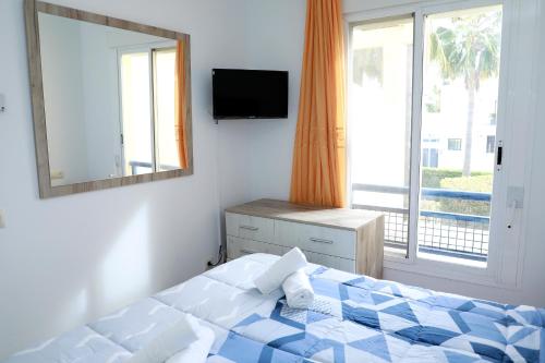 Postel nebo postele na pokoji v ubytování Apartamento Completo Luna de Vera