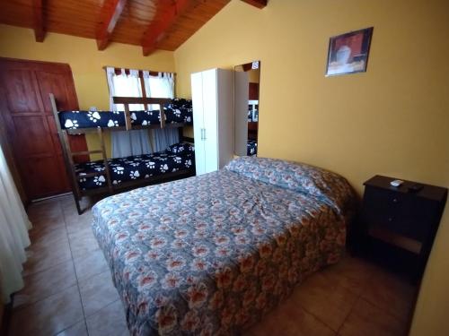 a bedroom with a bed in a room at Sophenia in Agrelo