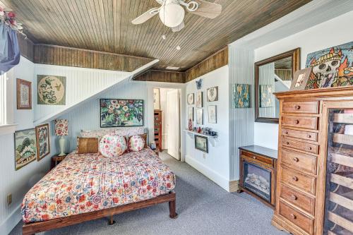 a bedroom with a bed and a wooden ceiling at Eclectic Wildomar Home 6 Mi to Santa Rosa Plateau in Wildomar