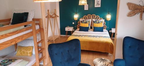 Ένα ή περισσότερα κρεβάτια σε δωμάτιο στο Maison d'Hôtes "L'ORIGINALE"