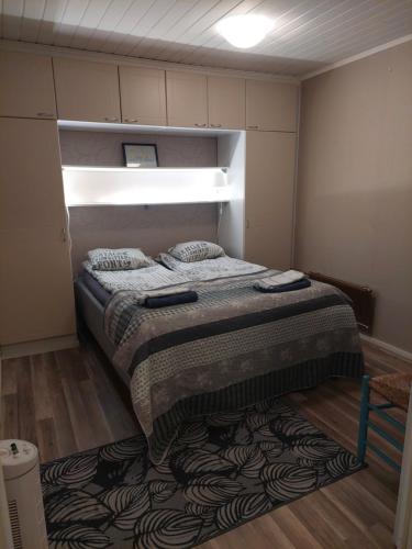 En eller flere senge i et værelse på Asunto Rautatiekatu 4