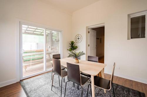 a dining room with a table and chairs at Lively 3BR Apt in Chicago - Milwaukee N3 in Chicago