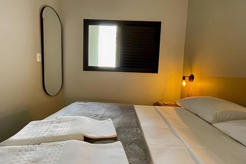 a bedroom with two beds and a window at MY STUDIO in Franca
