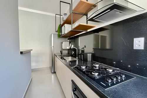 a kitchen with a stove top oven in a kitchen at MY STUDIO in Franca