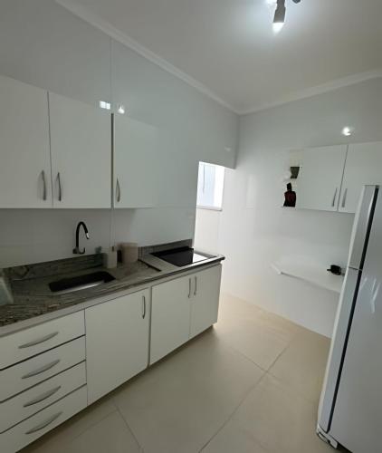 Kuchyň nebo kuchyňský kout v ubytování Apartamento no Centro!