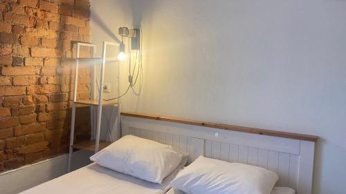 Katil atau katil-katil dalam bilik di Filosoofi 1 Studio Apartments
