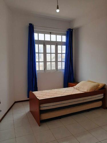 Postel nebo postele na pokoji v ubytování Appartement entier Mindelo