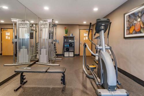 a fitness room with a treadmill and a gym at Best Western Plus Vineyard Inn in Livermore