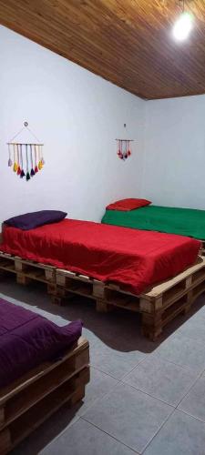 Postelja oz. postelje v sobi nastanitve Pancha la vida hostel