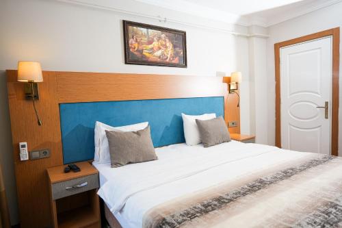 Ένα ή περισσότερα κρεβάτια σε δωμάτιο στο Seatanbul Hotel