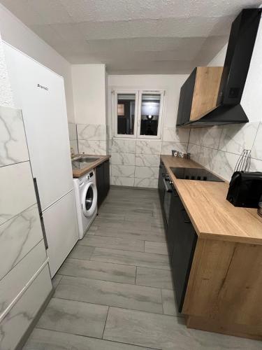 Η κουζίνα ή μικρή κουζίνα στο COSY F3 PROCHE CENTRE